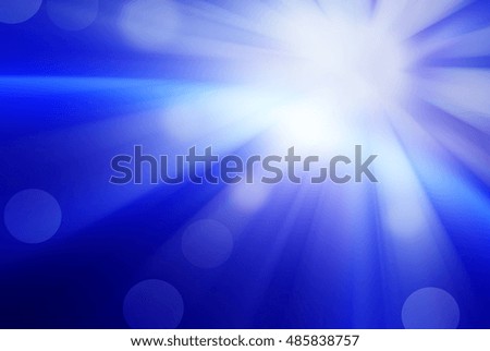 Abstract background in blue tones. Sun with lens flare.