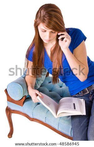 Teenager Talking on the Cell Phone on a Green Couch