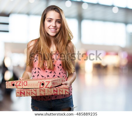 young woman holding a pizza boxes on white background