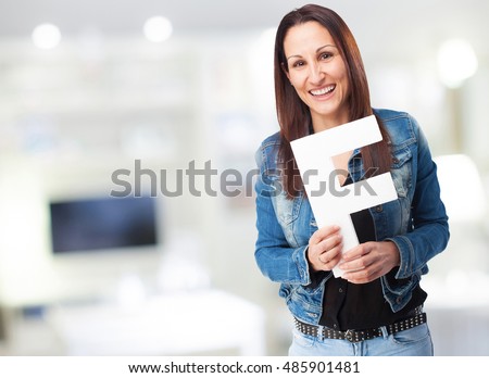 woman holding the F letter