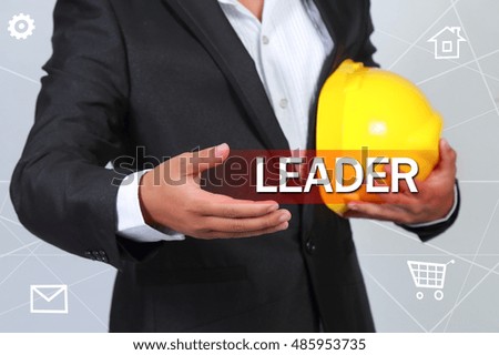 Text the  leader on the hands of the businessman, Business concept.