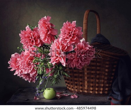 Still life with a basket of flowers