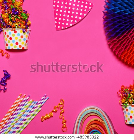 Happy Birthday flat lay with party decorations on pink background with space in center for your text
