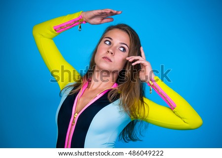 Young sport woman posing. Serious. Portrait