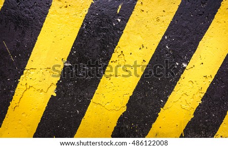 Grunge Black And Yellow Stripes Surface As Warning Or Danger Pattern, Old Concrete Textured, Danger Sign Background. Industrial Striped Road Warning Yellow Gray Texture Pattern