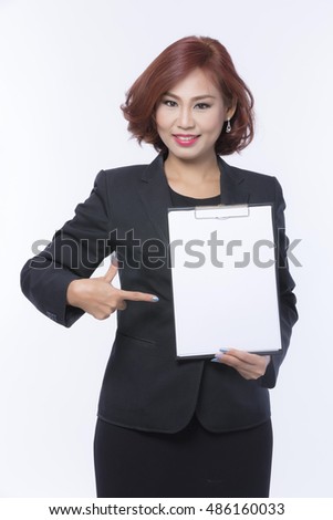 Business woman holding blank paper for business banner ad with approval hand sign.