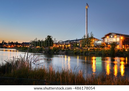 Renovated Old Industrial Riverside Buildings at Sunset in Bend, Oregon Royalty-Free Stock Photo #486178054