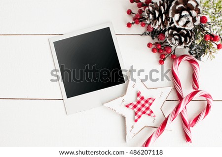 Blank photo frames and Christmas decor