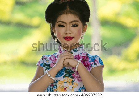 attractive asian little girl wearing traditional Japanese