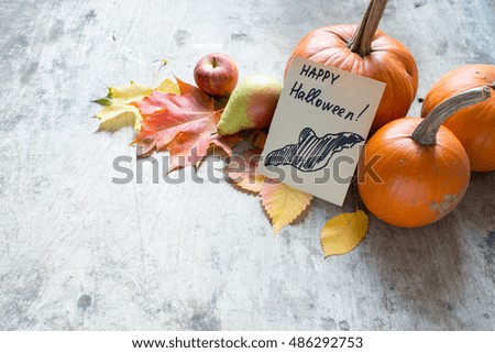 Pumpkins on a wooden background/Halloween day concept