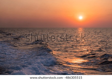 Sunset over waves at Adriatic sea 
