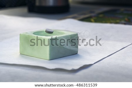 Demonstration of Superconductivity, Special Material Cooled with Liquid Nitrogen Royalty-Free Stock Photo #486311539