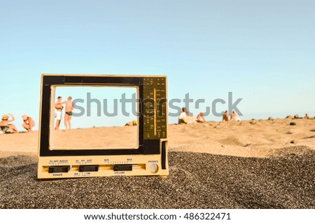 Photo Picture of a Television on the Sand Beach