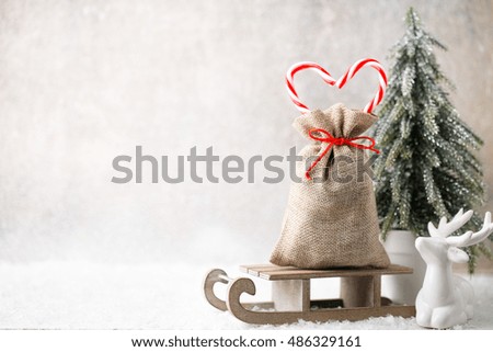 Christmas decoration. Gift bag with burlap. Christmas gard. 