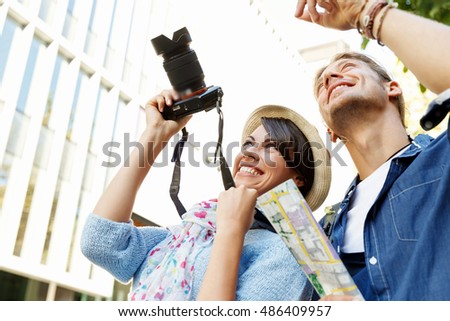 Smiling couple with the camera