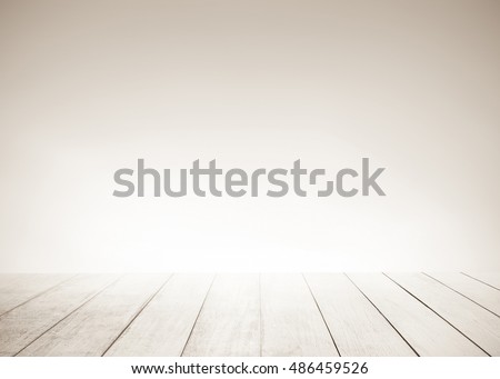 White old wood floor with blurred brown sepia tone background. Wooden planks stage texture and blur flare sunlight. Abstract medical backdrop. Focus to table top in the foreground.