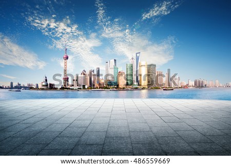Panoramic view of shanghai China skyline with huangpu river at dusk and the modern ground
