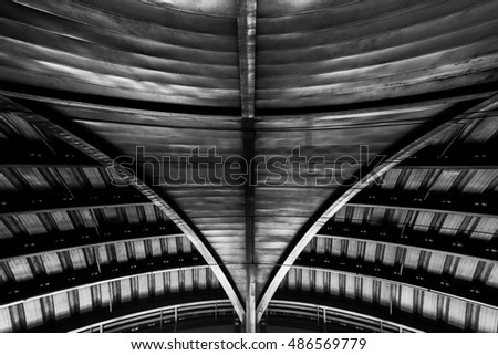 Low key photo, metal structure similar to spaceship interior in black and white