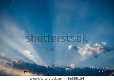 Beautiful sky with sunlight sun rays from clouds. Natural background.