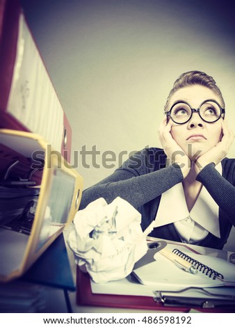 Paperwork job corporation lazy slow boring concept. Bored office employee at work. Female nerdy bureau clerk at desk.