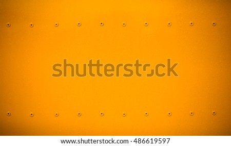 yellow metal background with dark vignette free copy space for text 