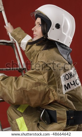 Picture of a girl in fireman uniform upstairs