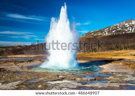 Strokkur geysir eruption, Golden Circle, Iceland Royalty-Free Stock Photo #486648907
