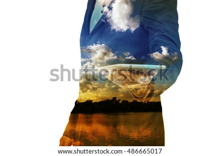 Close up of businessman with tablet with Cloud sky and Lake double exposure isolated on white