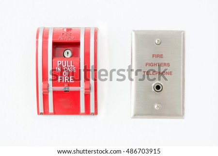 Fire alarm push button and plug  fire fighters telephone on wall