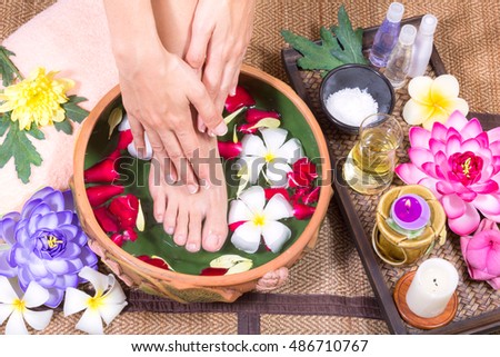 Closeup photo of a female feet at spa salon
