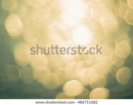 defocused of the sun reflecting on water surface ,texture background