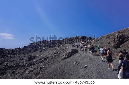People walking, Santorini Volcano tour, soft focus