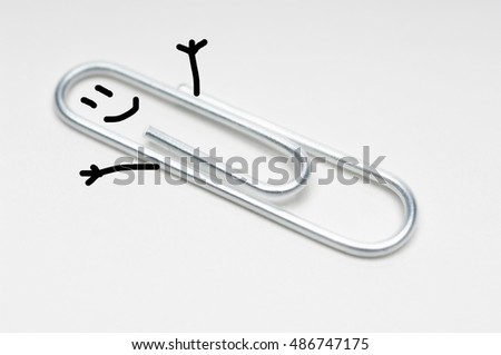 Happy Paperclip man or woman smiling and holding their hands up