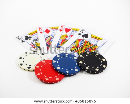 King card Four of a kind and casino chip isolate on white background