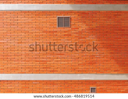 Orange brick walls and sleek roof building, background