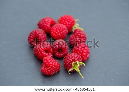 raspberries on chalkboard