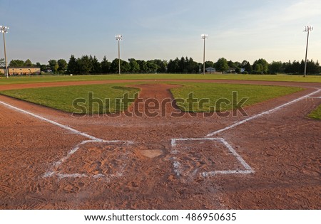 A wide angle shot of a baseball field.
 Royalty-Free Stock Photo #486950635