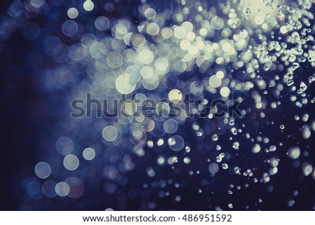 bokeh of water fly and lights background