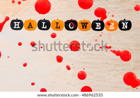Halloween background , black and orange pumpkins on wooden background