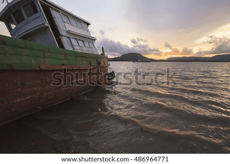 sunset ship aground