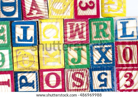 The cubical wooden with letter arranged disorderly suitable for background.  