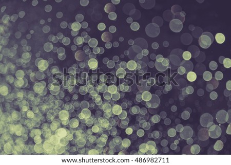 Blur and bokeh, vibrant colors. and textured. Lights on blue. Christmas luxury fresh elegant bokeh background.