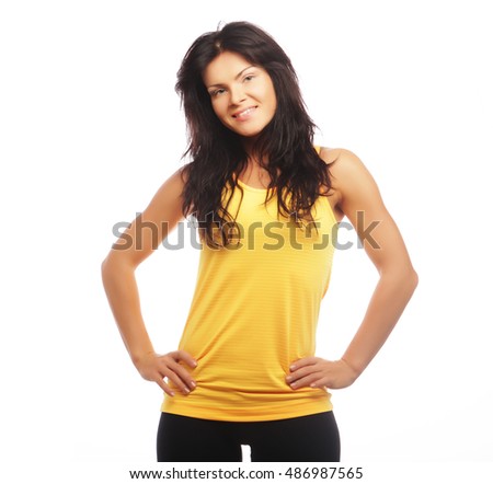 Portrait of a sporty woman. Diet, healthy lifestyle. Isolated on