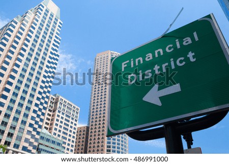 Detail of Boston skyline and traffic sign with the inscription Financial District
