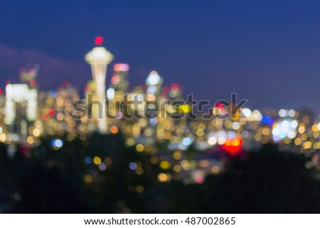 Seattle Washington city downtown skyline at dusk out of focus blurred bokeh city lights