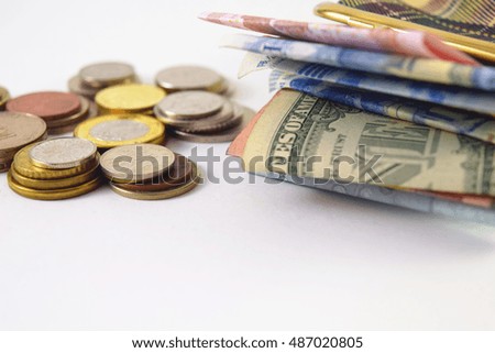 Currency that can be used to used to describe stock market, world economy, financial issues.