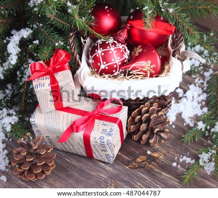 Christmas background with red baubles and gifts