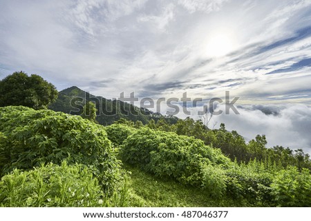 Mountain terrain with cloudy sky