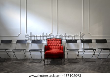 Comfortable armchair for a special guest Royalty-Free Stock Photo #487102093