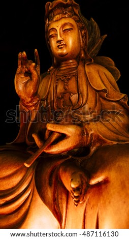 Vintage style of Buddha statue with light dark background . buddha image used as amulets of Buddhism religion.